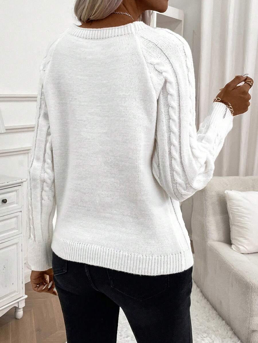 Clara – Pull en maille torsadée à boutons