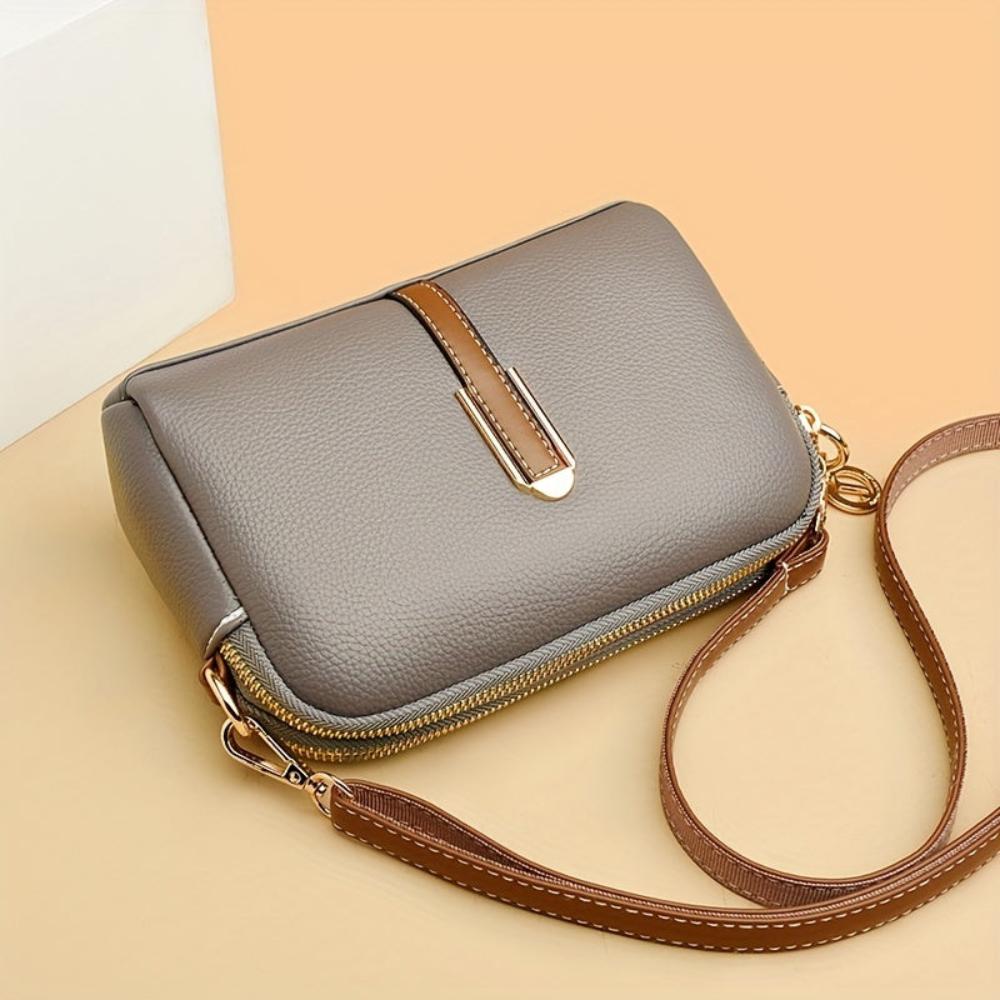 Bolso cruzado Mila con relieve Litchi